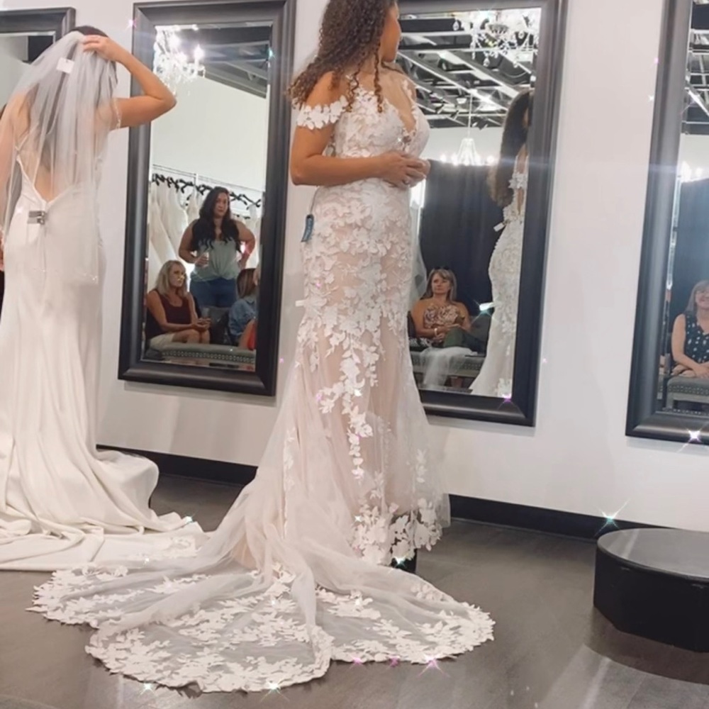 Lace fit and flare wedding dress
